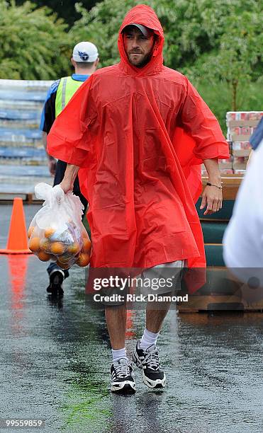 During lightening, hail and flash flood warnings Actor Luke Perry, part time Middle Tennessee resident volunteers with Soles4souls Inc.to bring...