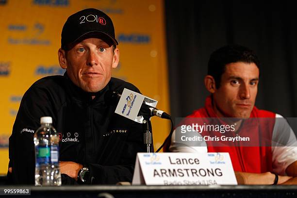 Lance Armstrong of Team Radio Shack speaks as George Hincapie of BMC Racing listens during a during a press conference prior to the 2010 Tour of...