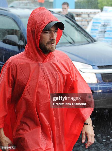 During lightening, hail and flash flood warnings Actor Luke Perry, part time Middle Tennessee resident volunteers with Soles4souls Inc.to bring...