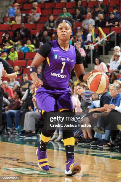 Odyssey Sims of the Los Angeles Sparks handles the ball against the Seattle Storm on July 10, 2018 at Key Arena in Seattle, Washington. NOTE TO USER:...