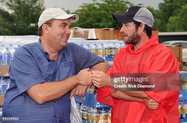 Founder and CEO of Soles4Souls Wayne Elsey and Actor Luke Perry, part time Middle Tennessee resident chat after voluntering with Soles4souls Inc.to...