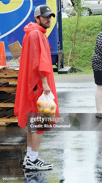 During lightening, hail and flash flood warnings Actor Luke Perry, part time Middle Tennessee resident volunteers with Soles4souls Inc.to bring...