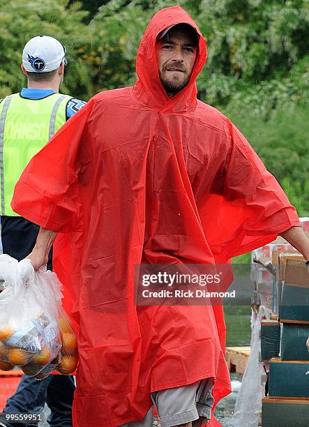 During lightening, hail and flash flood warnings Actor Luke Perry, part time Middle Tennessee resident volunteers with Soles4souls Inc.to bring...