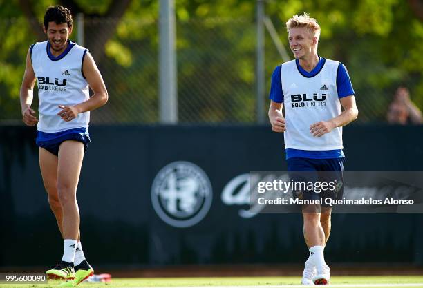 Daniel Wass and Daniel Parejo of Valencia CF during training session at Paterna Training Centre on July 10, 2018 in Valencia, Spain.