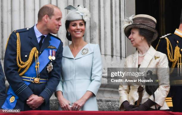 Prince William, Duke of Cambridge, Catherine, Duchess of Cambridge and Princess Anne, Princess Royal stand on the balcony of Buckingham Palace to...