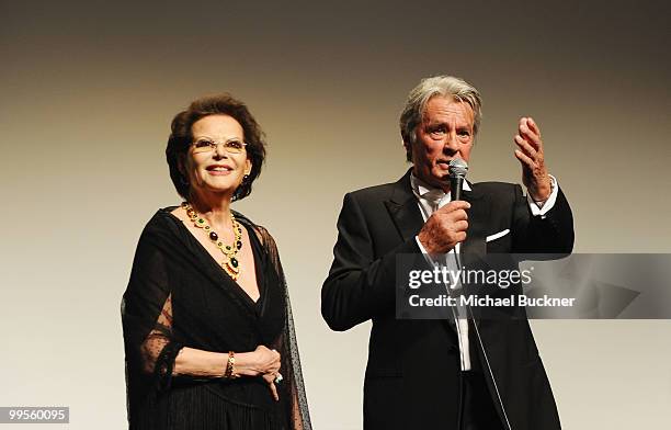 Actress Claudia Cardinale and actor Alain Delon attend the "IL Gattopardo" premiere at the Salla DeBussy during the 63rd Annual Cannes Film Festival...