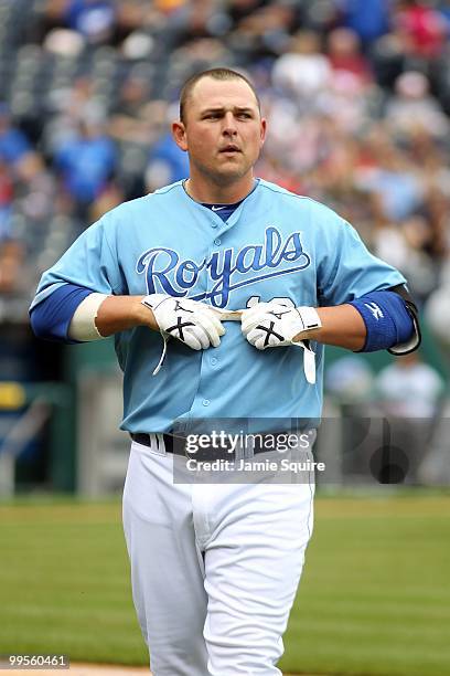 Billy Butler of the Kansas City Royals walks back to the dugout after grounding into a force out to end the 1st inning during the game against the...