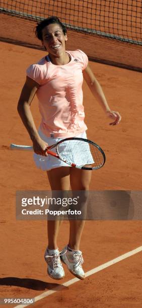 Francesca Schiavone of Italy reacts during her match on day 12 of the French Open at Roland Garros Stadium in Paris on June 2, 2011.