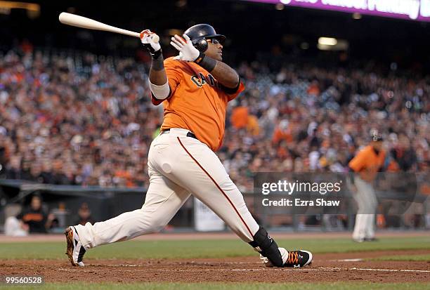 Pablo Sandoval of the San Francisco Giants scores Aaron Rowand on a ground out to second base in the second inning of their game against the Houston...