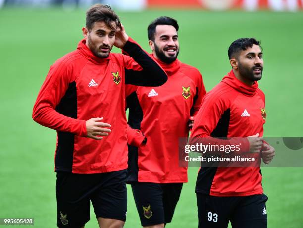 Oestersund's Sotirios Papagiannopoulus , Brwa Nouri and Saman Ghoddos in action during a training session before the 2nd Europa League soccer match...