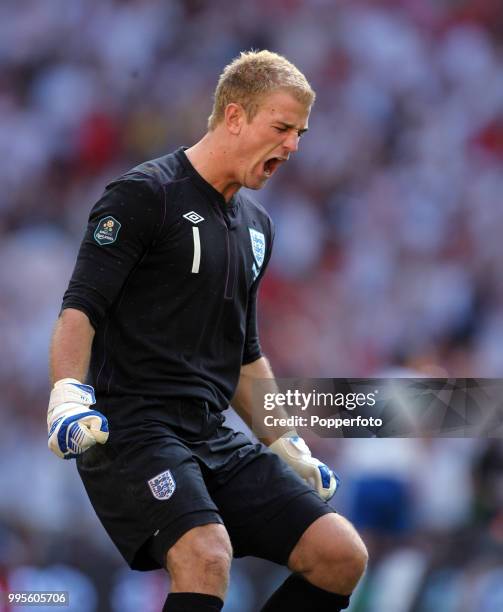 England goalkeeper Joe Hart celebrates after England's second goal during the UEFA EURO 2012 group G qualifying match between England and Switzerland...