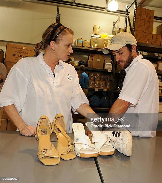 Actor Luke Perry, part time Middle Tennessee resident and Publist Kim Dettwiller volunteer with Soles4souls Inc.to bring relief to Nashville flood...
