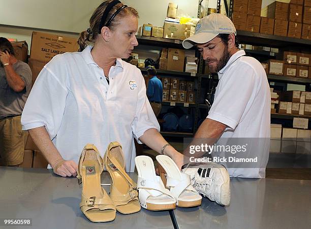 Actor Luke Perry, part time Middle Tennessee resident and Publist Kim Dettwiller volunteer with Soles4souls Inc.to bring relief to Nashville flood...