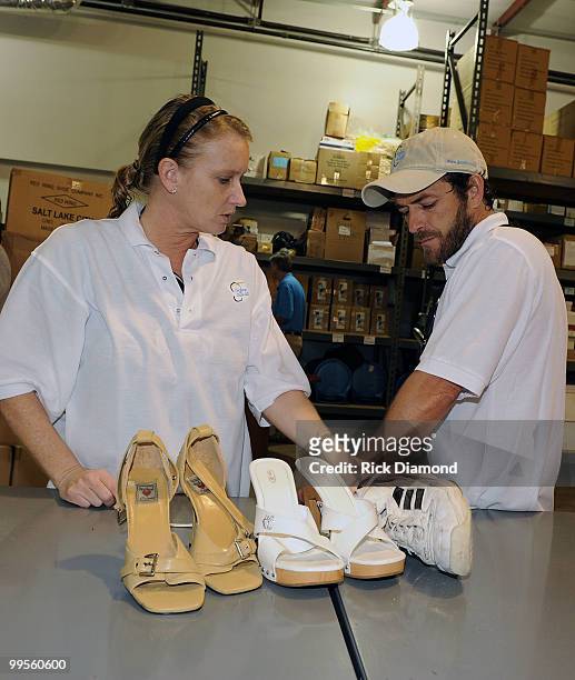 Actor Luke Perry, part time Middle Tennessee resident and Publist Kim Dettwiller volunteer with Soles4souls Inc.to bring relief to Nashville flood...