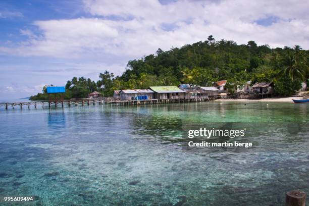 fisherman village on gam island, raja ampat, indonesia. - gam ストックフォトと画像