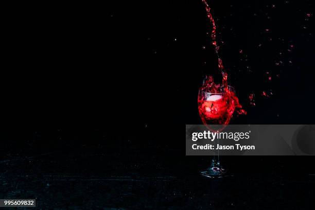 golf ball splash - golf ball in air stock pictures, royalty-free photos & images