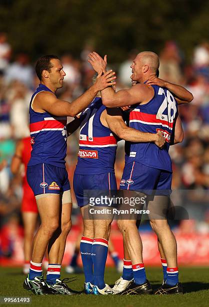 Barry Hall of the Bulldogs celebrates a goal during the round eight AFL match between the Western Bulldogs and the Sydney Swans at Manuka Oval on May...