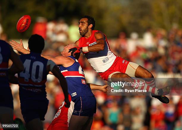 Barry Hall of the Bulldogs is spoiled by Adam Goodes of the Swans during the round eight AFL match between the Western Bulldogs and the Sydney Swans...