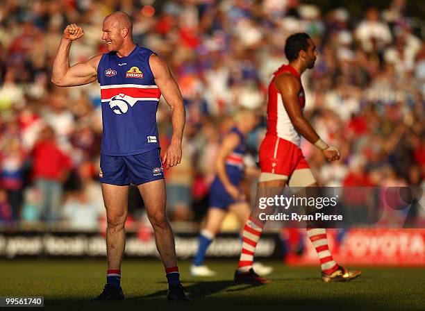 Barry Hall of the Bulldogs celebrates a goal during the round eight AFL match between the Western Bulldogs and the Sydney Swans at Manuka Oval on May...