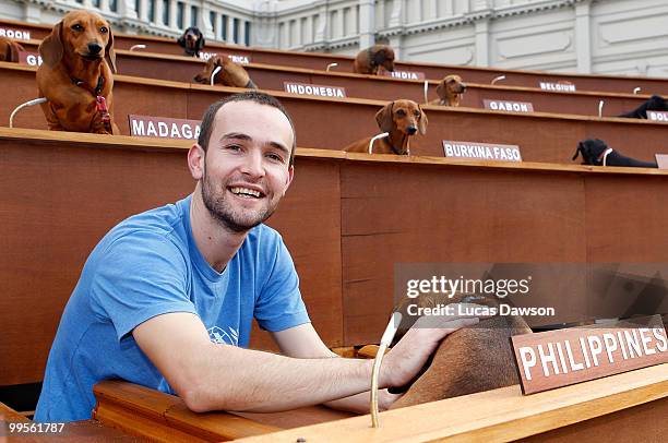 Artist Bennett Miller poses for a photo during a performance and art installation titled 'Dachshund U.N.' at the Melbourne Museum on May 15, 2010 in...