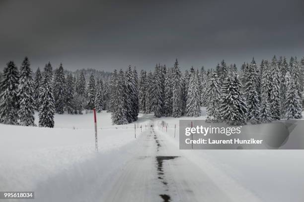 snow road - hunziker stock pictures, royalty-free photos & images