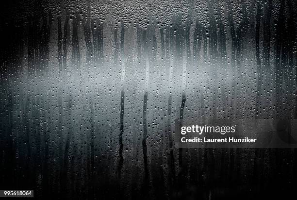 mist on window - hunziker stock pictures, royalty-free photos & images