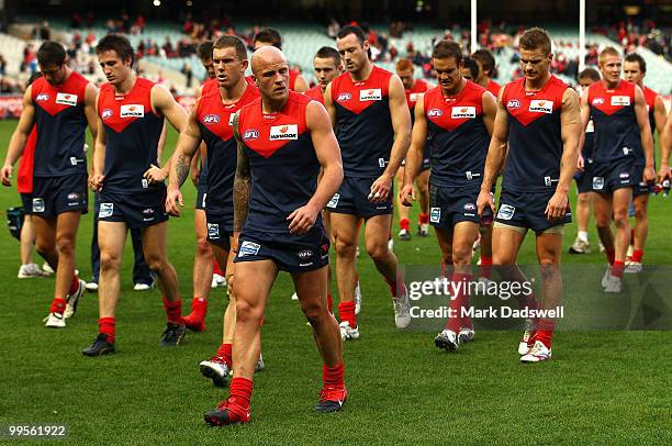 Nathan Jones of the Demons leads the team off after their defeat in the round eight AFL match between the Melbourne Demons and the West Coast Eagles...