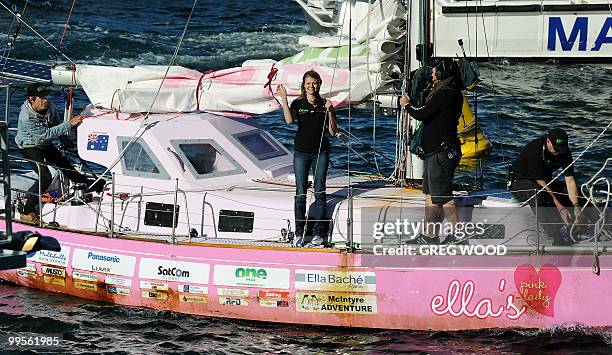 Australian round-the-world sailor, Jessica Watson , age 16, brings her yacht 'Ella's Pink Lady' into the Sydney Opera House after crossing over the...