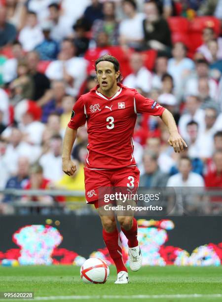 Reto Ziegler of Switzerland in action during the UEFA EURO 2012 group G qualifying match between England and Switzerland at Wembley Stadium in London...