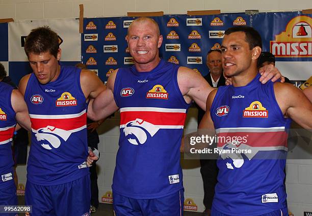Barry Hall of the Bulldogs sings the club song after the round eight AFL match between the Western Bulldogs and the Sydney Swans at Manuka Oval on...