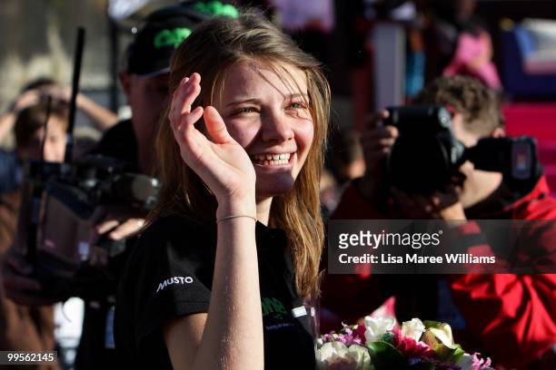 Teen sailor Jessica Watson waves to the crowd as she arrives back home in Sydney following her world record attempt to become the youngest person to...