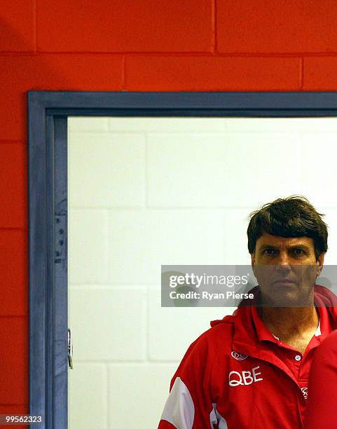 Paul Roos, coach of the Swans, looks on from the team meeting room before the round eight AFL match between the Western Bulldogs and the Sydney Swans...