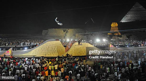 In this handout image from Global-Newsroom, US rider Adam Jones in action during the finals of the second stage of the Red Bull X-Fighters world...