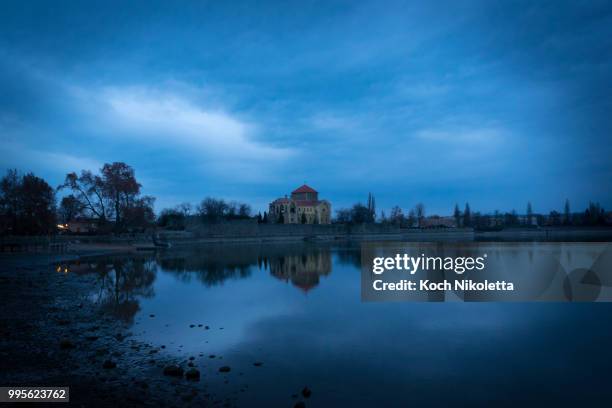 blue hour by the old lake tata - tata hungary stock pictures, royalty-free photos & images