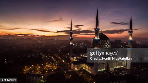 sunrise masjid shah alam - shah alam stock pictures, royalty-free photos & images