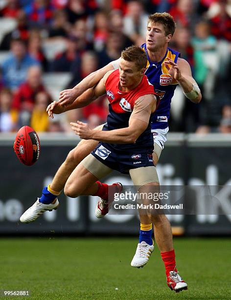 Colin Sylvia of the Demons competes with Beau Waters of the Eagles during the round eight AFL match between the Melbourne Demons and the West Coast...