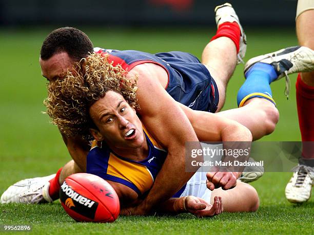 Matt Priddis of the Eagles loses the ball as he is tackled during the round eight AFL match between the Melbourne Demons and the West Coast Eagles at...