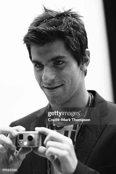 Jaime Alguersuari of Spain and Scuderia Toro Rosso models at the Amber Fashion Show and Auction held at the Meridien Beach Plaza on May 14, 2010 in...