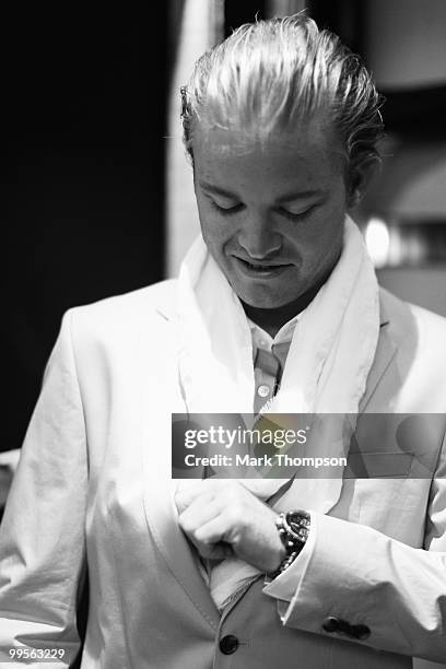 Nico Rosberg of Germany and Mercedes GP models at the Amber Fashion Show and Auction held at the Meridien Beach Plaza on May 14, 2010 in Monte Carlo,...