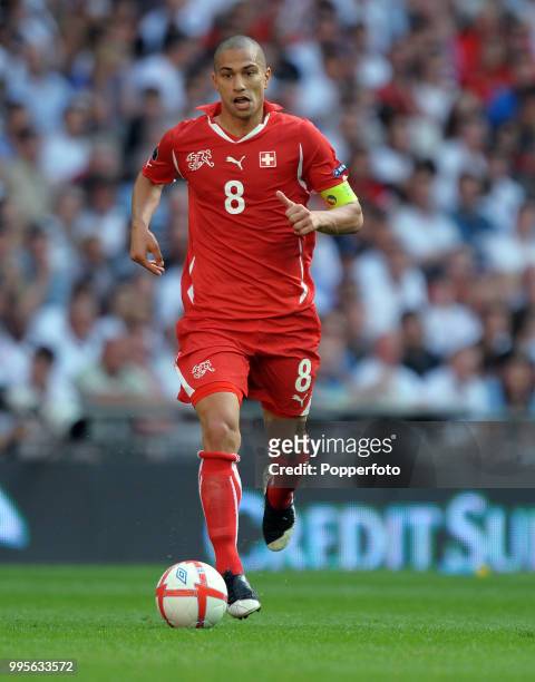 Gokham Inler of Switzerland in action during the UEFA EURO 2012 group G qualifying match between England and Switzerland at Wembley Stadium in London...