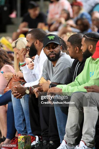 Kyrie Irving of the Boston Celtics attends the game between the Los Angeles Sparks and the Seattle Storm on July 10, 2018 at Key Arena in Seattle,...