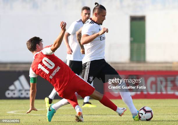 Benfica midfielder Ljubomir Fejsa from Serbia with FK Napredak midfielder Milos Vulic from Serbia in action during the Pre-Season Friendly match...