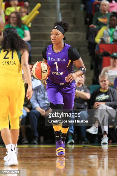 Odyssey Sims of the Los Angeles Sparks handles the ball against the Seattle Storm on July 10, 2018 at Key Arena in Seattle, Washington. NOTE TO USER:...