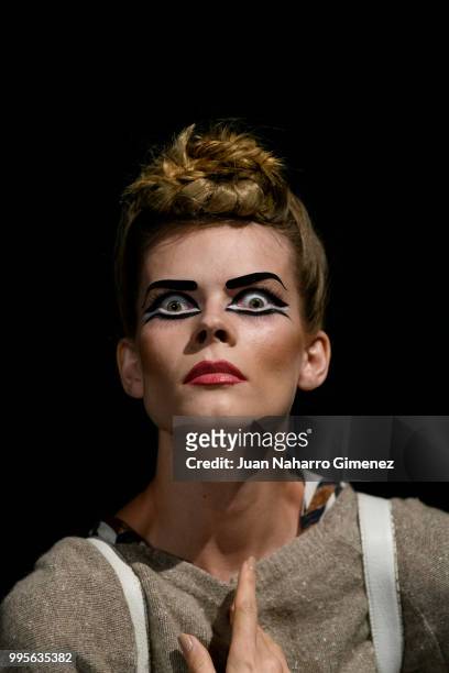 Model is seen backstage before the Ana Locking fashion show during the Mercedes-Benz Fashion Week Madrid Spring/Summer 2019 at IFEMA on July 10, 2018...
