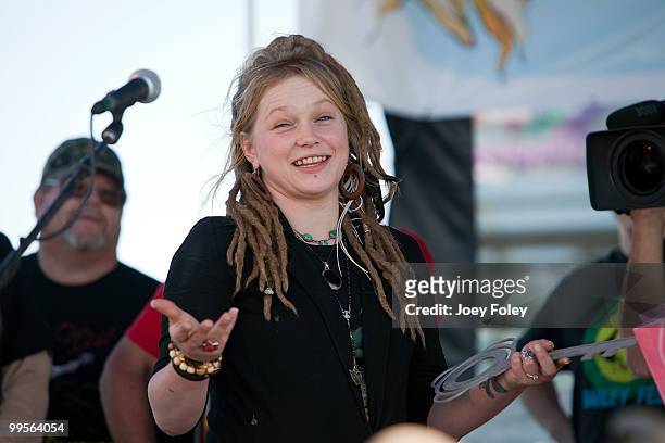 Crystal Bowersox reacts as she receives the key to her home town of Elliston onstage during her "American Idol" homecoming parade and performance at...