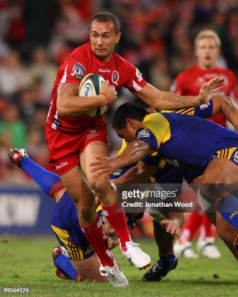 Quade Cooper of the Reds in attack during the round 14 Super 14 match between the Reds and the Highlanders at Suncorp Stadium on May 15, 2010 in...