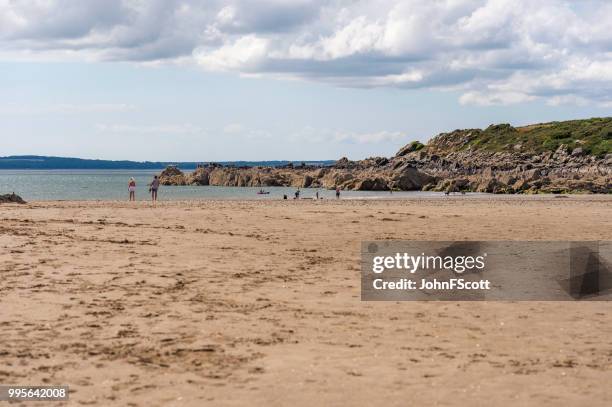 members of the public on a scottish beach - johnfscott stock pictures, royalty-free photos & images