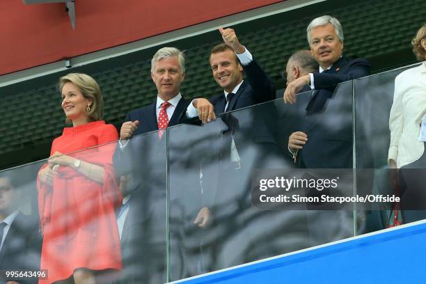 King Philippe of Belgium and his wife, Queen Mathilde stand alongside French President Emmanuel Macron during the 2018 FIFA World Cup Russia Semi...