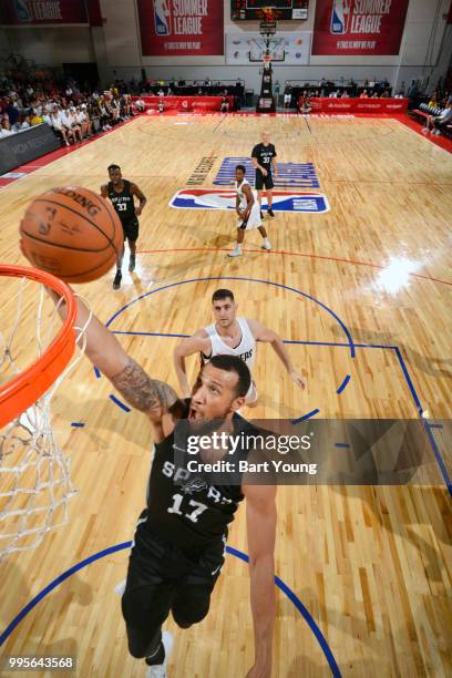 Trey McKinney-Jones of the San Antonio Spurs goes to the basket against the Portland Trail Blazers during the 2018 Las Vegas Summer League on July...