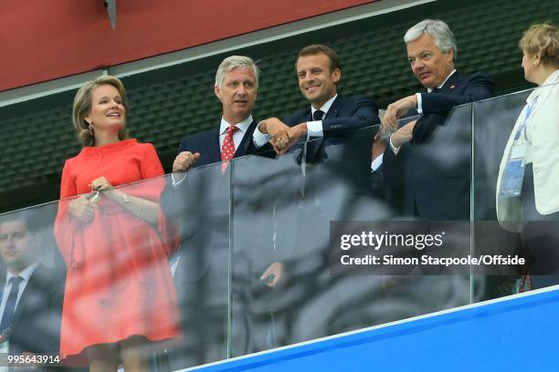 King Philippe of Belgium and his wife, Queen Mathilde stand alongside French President Emmanuel Macron during the 2018 FIFA World Cup Russia Semi...